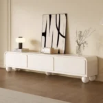 Nordic wood TV stand with drawers in a modern living room corner, featuring clean lines and ample storage