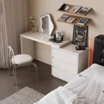 Modern vanity table with mirror and drawers in a bedroom setting
