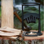 Professional wood splitter tool with ergonomic handle on a log