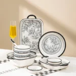 Elegant 20-piece porcelain dinnerware set arranged on a table, showcasing bowls and plates in a gift box