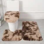 Plush bathroom rug set with toilet lid cover and mat in a modern bathroom