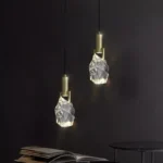 Modern crystal pendant lamp illuminating a dining room with elegant light refraction