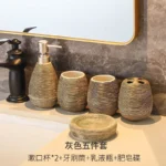 Soap dispenser pump detail, ceramic top with a vintage brass finish.