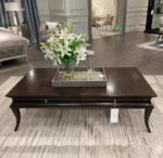 Minimalist coffee table with metal frame in a modern living room setting, Goldoma