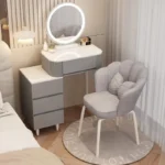 Modern storage vanity table with mirror and stool featuring multiple drawers for bedroom organization