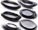 Black melamine dinner plates stacked elegantly on a wooden table