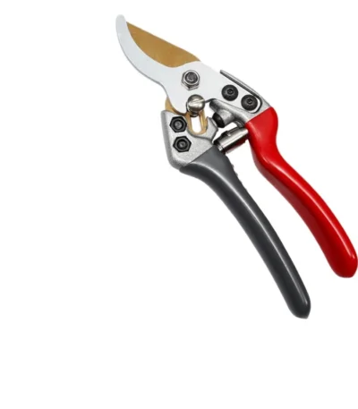 Goldoma pruning shears with orange handles and sharp steel blades on a white background.