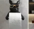 Goldoma wall mounted toilet paper holder in chrome, front view with tissue roll and mobile phone resting on top.