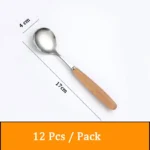 Stainless steel flatware set with wooden handles displayed on a table