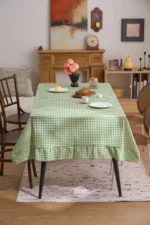 French country tablecloth with retro plaid pattern and lotus leaf edge on a dining table