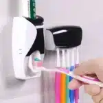 1 set of easy-to-use toothbrush holder with automatic toothpaste dispenser, wall mounted toothbrush storage rack, and