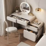 Modern cream dressing table with storage drawers and mirror in bedroom setting