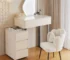 Modern Nordic makeup vanity with mirror and storage drawers in a bright bedroom