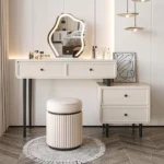 Modern vanity table with mirror and drawers in a bedroom setting