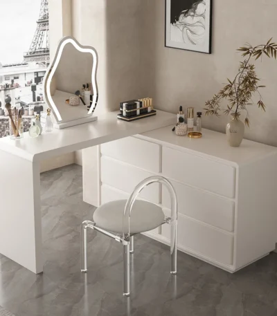 Modern LED vanity desk with mirror and stool in bedroom setting