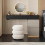 Minimalist modern dressing table with mirror and stool in a bedroom setting with 4 drawers and 4 doors