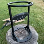 Professional wood splitter tool with ergonomic handle on a log