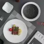 Black dish ceramic plate disc white Western restaurant tableware Barbecue grilled meat serving plate Ceramic frosted steak