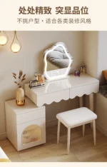 Modern makeup vanity desk with mirror and stool in a bedroom setting, showcasing ample storage and elegant design