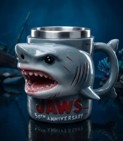 Jaws 50th Anniversary 3D shark mug on a wooden table with coffee