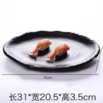Black melamine dinner plates stacked elegantly on a wooden table