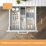 Kitchen drawer organizer with compartments for cutlery and utensils