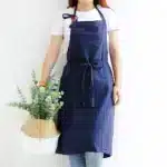 Vintage Washed Cotton Apron Japanese Simple Style Slim Long Apron Baking Cooking Nail Salon Workwear – in a cozy room setting