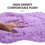 Plush bathroom rug set with toilet lid cover and mat in a cozy bathroom