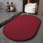 Quick dry bath mat with braided chenille texture in a modern bathroom