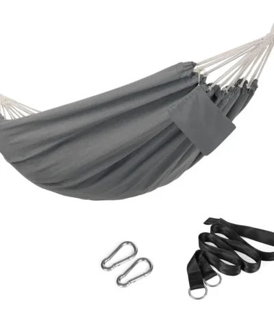 Grey double hammock outdoor hanging between trees in a garden