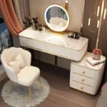 French white wooden dressing table with mirror and stool in a modern bedroom setting