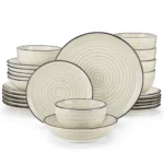 Vancasso handpainted dinnerware set in beige with spiral design on a wooden table