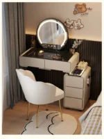 Goldoma modern minimalist dressing table with mirror and six drawers in a bedroom setting