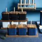 Ceramic kitchen storage container set with matte striped design and spoon