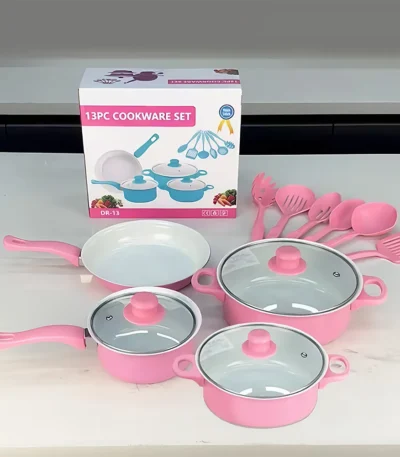 12-piece non stick cookware set with pots, pans, and lids on a modern kitchen countertop