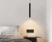Modern pendant light with double cylindrical shades in a Nordic dining room setting