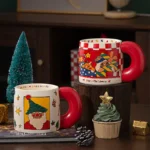Red and white Santa Claus Christmas coffee mugs with handle on wooden table
