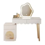 Modern makeup vanity desk with mirror and stool in a bedroom setting, showcasing ample storage and elegant design