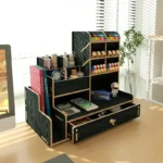 Wooden office stationery storage rack with multiple compartments, natural wood finish, on a desk with a laptop.
