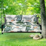 Outdoor bench cushion on a wooden garden bench with vibrant floral pattern