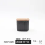 Ceramic kitchen storage container set with matte striped design and spoon