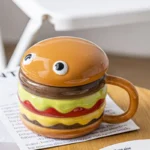 Large ceramic mug with lid in hamburger shape, 300ml capacity, colorful design