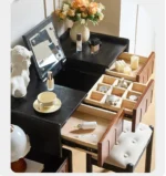 Goldoma ash wood dressing table with mirror and six drawers in a bedroom setting