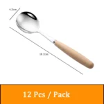 Stainless steel flatware set with wooden handles displayed on a table