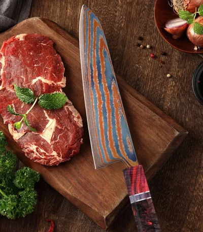 8-inch Damascus chef knife with titanium timascus blade and stabilized colored wood handle on cutting board