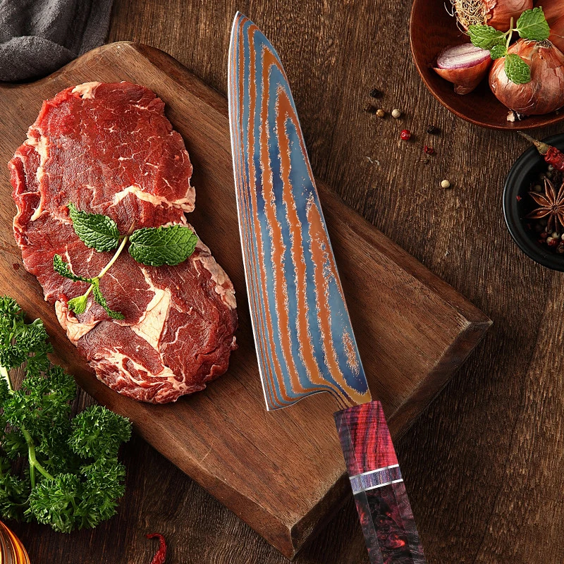 8-inch Damascus chef knife with titanium timascus blade and stabilized colored wood handle on cutting board