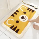 Non slip bathroom rug with frog and bear flocking design on bathroom floor