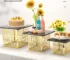 Elegant dessert display stand with multi-tier cake trays for buffet and tea break