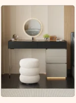 Minimalist modern dressing table with mirror and stool in a bedroom setting with 4 drawers and 4 doors