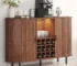 Elegant walnut buffet with wine rack, LED lights, and glass holder in a modern living room